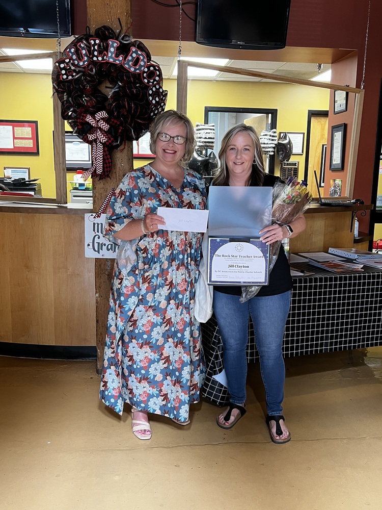Jill Clayton receiving Rock Star Teacher award