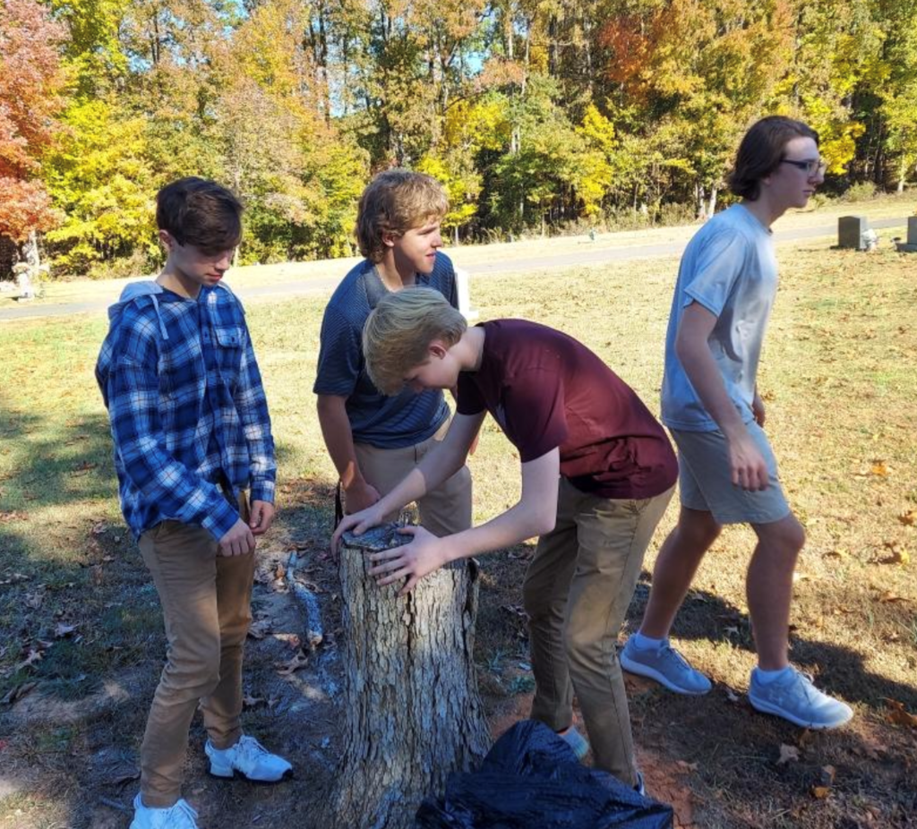 cleaning up cemetery