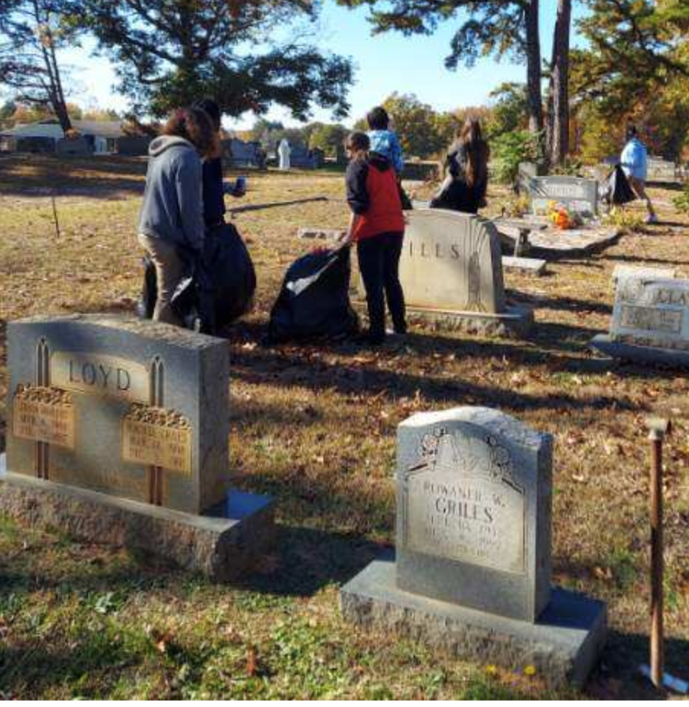 cleaning up cemetery