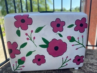 suitcase painted with flowers