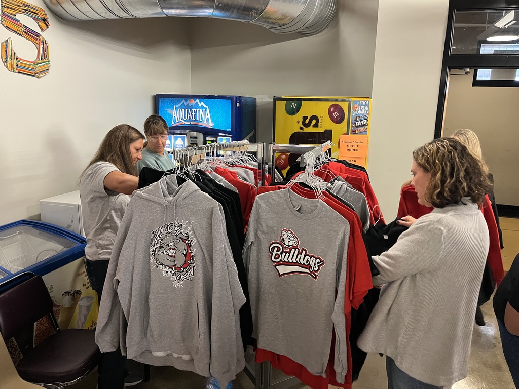 Teachers browse the RCS gear sale